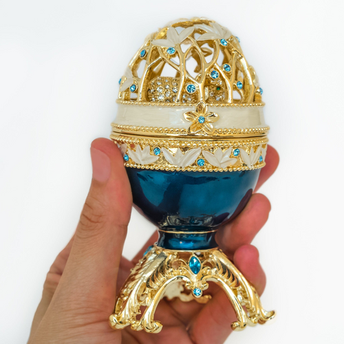 Ou stil Fabergé Keren Kopal albastru auriu cu elefant auriu